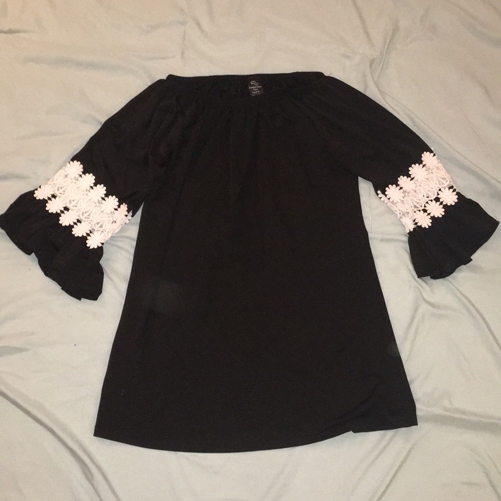 Black flowy short with flower lace on the sleeves